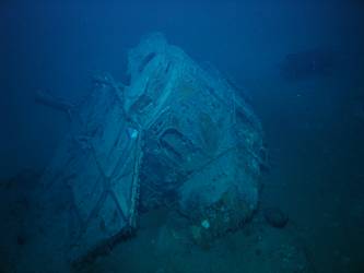 Bridge deck head resting against Director Control Tower on seabed